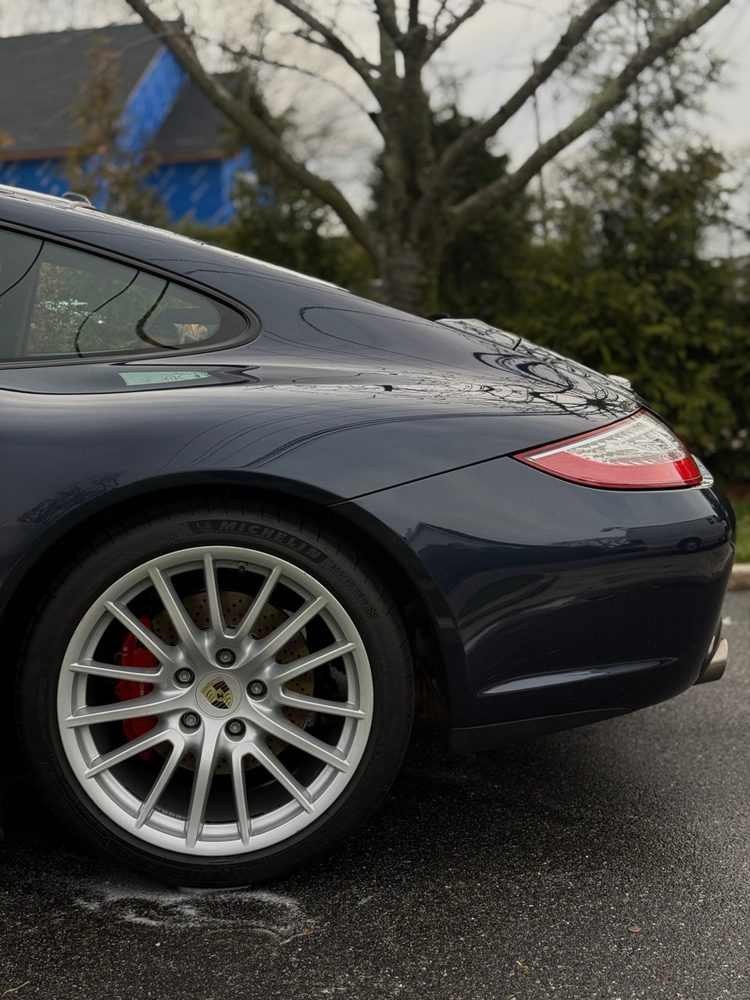 Porsche 911 rear quarter with polished wheel