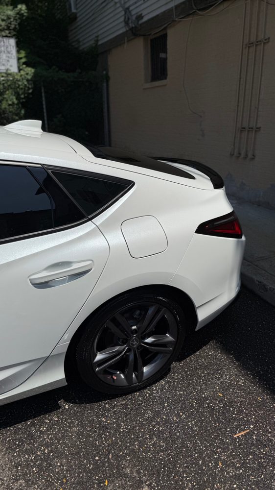 White Porsche Panamera after a wash and seal