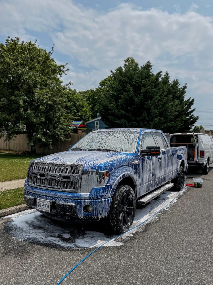 Ford F-150 covered in foam during a wash