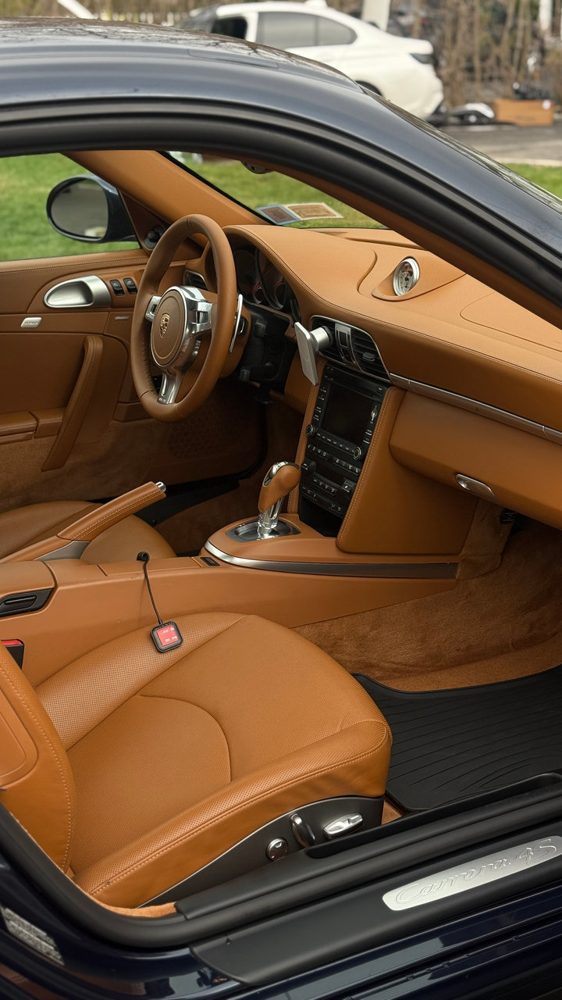 Porsche interior with tan leather seats cleaned